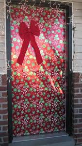 Holiday Decor Wrapping Your Front Door Like A Giant Christmas Present Front Door Christmas Decorations Christmas Arts And Crafts Christmas Decor Diy