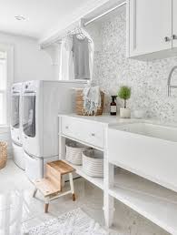 Personally, if i was starting from scratch i would focus around laundry room storage ideas which would incorporate washing and drying machines, a spot for the ironing board, broom and mop and a large laundry sink. 33 Small Laundry Room Ideas Sebring Design Build