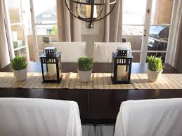 Dining Room Table Centerpiece Candle Splendid Two Black Lanterns With White Candle Modern Kitchen Tables Dining Room Table Decor Dining Room Table Centerpieces