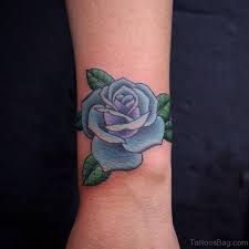 For example, you can choose a black rose tattoo and make it on the wrist, an ankle or even behind the ear. 22 Cool Blue Rose Tattoos On Wrist
