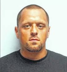 Five charged after home search