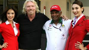 We're airasia, the asean super app that lets you travel, experience, shop,eat & enjoy rewards! Branson Leaves Abu Dhabi With Airasia Uniform
