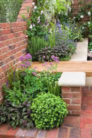Pin By Ana Filippo On Gardening Patio Plants Brick Garden Backyard Garden Design
