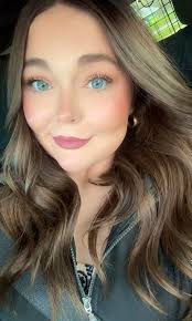 Can someone turn this into a professional headshot ?