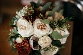 Mt annan, sydney australia ~. Vintage Inspired Wedding Bouquet With Ivory Roses Burgundy Flowers And Greenery Bouquet With Rose Gold Engagement Ring And Wedding Ring Tampa Bay Planner Kelly Kennedy Weddings And Events Marry Me