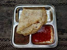 #chhattisgarhifood amazing food but signature dish is cutting dosa. 7 Best Street Foods In Raipur Streetfoodindia Tripoto