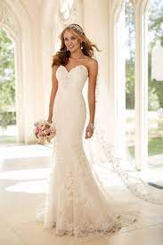 This Designer Fit And Flare Strapless Wedding Dress From Stella York Is Made From Gorgeo Fit And Flare Wedding Dress Fitted Wedding Dress Wedding Dresses Satin