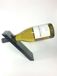 Maybe you would like to learn more about one of these? Venta Leaning Wine Bottle Holder En Stock