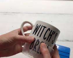 Clean your mug where the decal will go with rubbing alcohol. Easy Witch S Brew Coffee Mug Decal Using Your Cricut Megan Plus Five