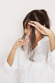Keep this up for a few weeks until your hair starts naturally falling to the left or right. How To Cut Your Own Bangs A Cup Of Jo