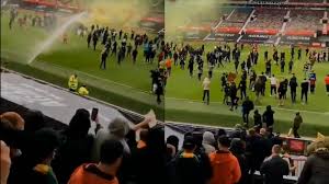 Old trafford is a football stadium in old trafford, greater manchester, england, and the home of manchester united. Fans Invade Pitch And Damage Equipment At Old Trafford
