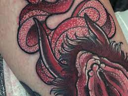 Devil vagina tattoo