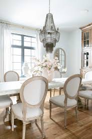 A typical dining room page will give you ideas on everything from light fixtures to dinnerware. Dining Room Decor Marble Dining Table And French Oval Back Chairs Beaded Chandelier And Linen Curtains In 2020 Dining Room Design Home Decor Dining Table Marble