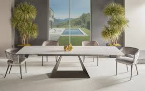 By adding a top quality dining tables, chairs, vitrines, bars from our italian manufacturers you can easily turn this most important focal point of your home into a unique private atmosphere. Modern Elite Modern Prism Dining Table Unique Furniture