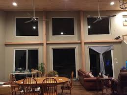 Sliding glass doors offer a wide view of the outdoors, helping connect you with your surroundings. Window Treatments For Large Windows Tall Ceilings And Sliding Doors