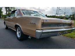 Image result for Singapore Gold 1964 GTO