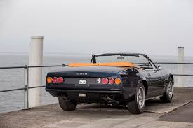 The convertible top looks good up or down, and folds easily out of sight when down. Ferrari 365 Gtc 4 Spyder Cars 1971 Wallpaper 4096x2730 936918 Wallpaperup