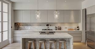 We also love how the glass pendant lighting makes an artistic statement. 25 Ways To Style Grey Kitchen Cabinets