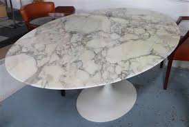 The saarinen oval dining table, which was designed by eero saarinen in 1956, stands tall from the beautifully shaped aluminum base that was inspired by liquid. Saarinen Eero Knoll Saarinen Oval Dining Table Mutualart