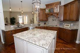 Alaska White Granite Kitchen Island With White Cabinets In A Wentzville Mo Home White Granite Kitchen White Granite Countertops Kitchen Granite Countertops