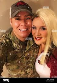 Air National Guard Captain Scott Lang and his wife Lindsey show their  support for the Arkansas Razorbacks during the 2018 season Stock Photo