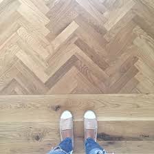 Herringbone White Oak Wood Floors Stained A Custom Blend Of Minwax Driftwood And Pickled Herringbone Wood Floor White Oak Hardwood Floors Hardwood Floor Colors