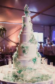 Black with white flower cascade gold medallion #w100. 21 Wedding Cakes That Shy Away From Tradition