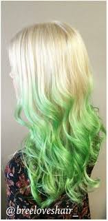 Blondes, especially those who have highlights or are colored from a bottle or stylist, are more susceptible to getting green hair from swimming in a. Green And Blonde Ombre Dyed Hair Black And Green Hair Green Hair Green Hair Colors