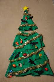 For this diy christmas tree, collect some fallen tree branches in various sizes, and tie them up in the shape of a tree, where the largest branch will form the base. Christmas Tree Costume