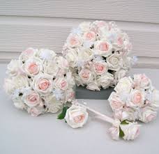Gather three of the ribbons together and fold their ends together to create loops. Emily Rose Blush Wedding Flower Package Rosie Silk Flowers
