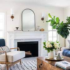 You can buy mantels in every color from. Black Arch Living Room Mirror Design Ideas