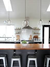 These lanterns in black or oiled bronze bring character and illumination to outdoor settings such as porches, patios and decks. Modern Kitchen Island Light Fixture Novocom Top