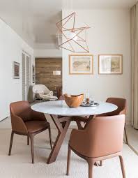 A Modern European Inspired High Rise Home In Houston Texas Rue Dining Room Industrial European Home Decor Mid Century Dining Room