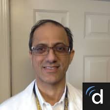 Dr. Clinton E. Curtis, MD