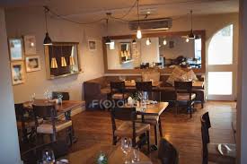 As one of the uk's leading cafe furniture and bistro furniture suppliers, café reality offers a huge range of high quality furniture from tables and chairs to beautiful, retro and contemporary designer restaurant furniture to help you to create the perfect atmosphere in which customers can relax, are comfortable and will enjoy your wonderful. Tables And Chairs Arranged In Empty Modern Coffee Shop Nobody Sofa Stock Photo 225294060