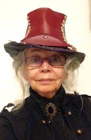 Steampunk hat made from old pouch spec cases, boot laces and kids felt