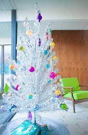 A christmas tree adorned with ornaments and lights is a centrepiece of the festive season. Our Vintage Aluminum Christmas Tree Mid Century Modern Interior Designer Portfolio