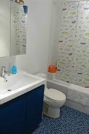 Tie a space together with a consistent pattern. Kids Bathroom Curtains Susan Kids Bathroom Design Ideas Kids Bathroom Accessories Bathroom Kids Kids Bathroom Sets