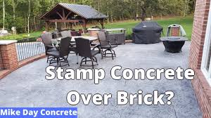 A flat area of concrete that can be used for a variety of purposes, such as a patio or a driveway 2 mortar : Stamped Concrete Patio Over Existing Brick Patio Youtube