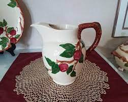 It stands 8 1/2 tall and holds 64 oz. Franciscan Pitcher Etsy