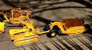 Image result for Caterpillar Yellow 1995 Fleet