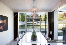 Leekous upgraded version modern glass top cocktail coffee table for living room, black coffee table with storage shelf, 43 inch rectangle glass center tables, sofa side table with wood legs. Centerpieces On Table In Modern Dining Room Comfort Design Stock Photo 199730946