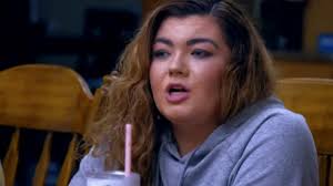 BreakingNews amber breaks silence