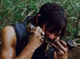 Daryl Eats A Snake The Walking Dead Daryl Dixon Norman Reedus
