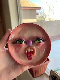 Earrings made with blue German antique faces