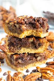 Modipie your normal thanksgiving desserts spread by trying these chocolate drizzled pecan pie bars. Chocolate Pecan Pie Bars Recipe Evolving Table