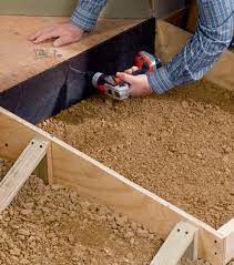 This article teaches you how to prepare for and pour a concrete walkway or sidewalk. How To Make A Concrete Ramp Diy Mother Earth News
