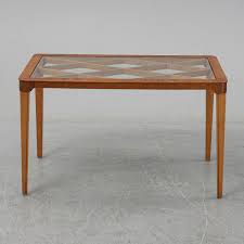French art deco large coffee or cocktail table, black glass top circa 1940s. A 1940 S Coffee Table Bukowskis
