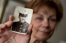 Never forgotten: Volunteers match faces to names of Vietnam War dead