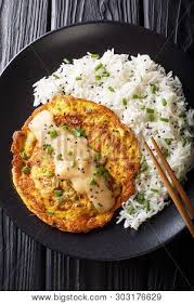 Egg foo young is an omelette dish found in chinese indonesian, british and chinese american cuisine. Chinese Omelette Egg Image Photo Free Trial Bigstock